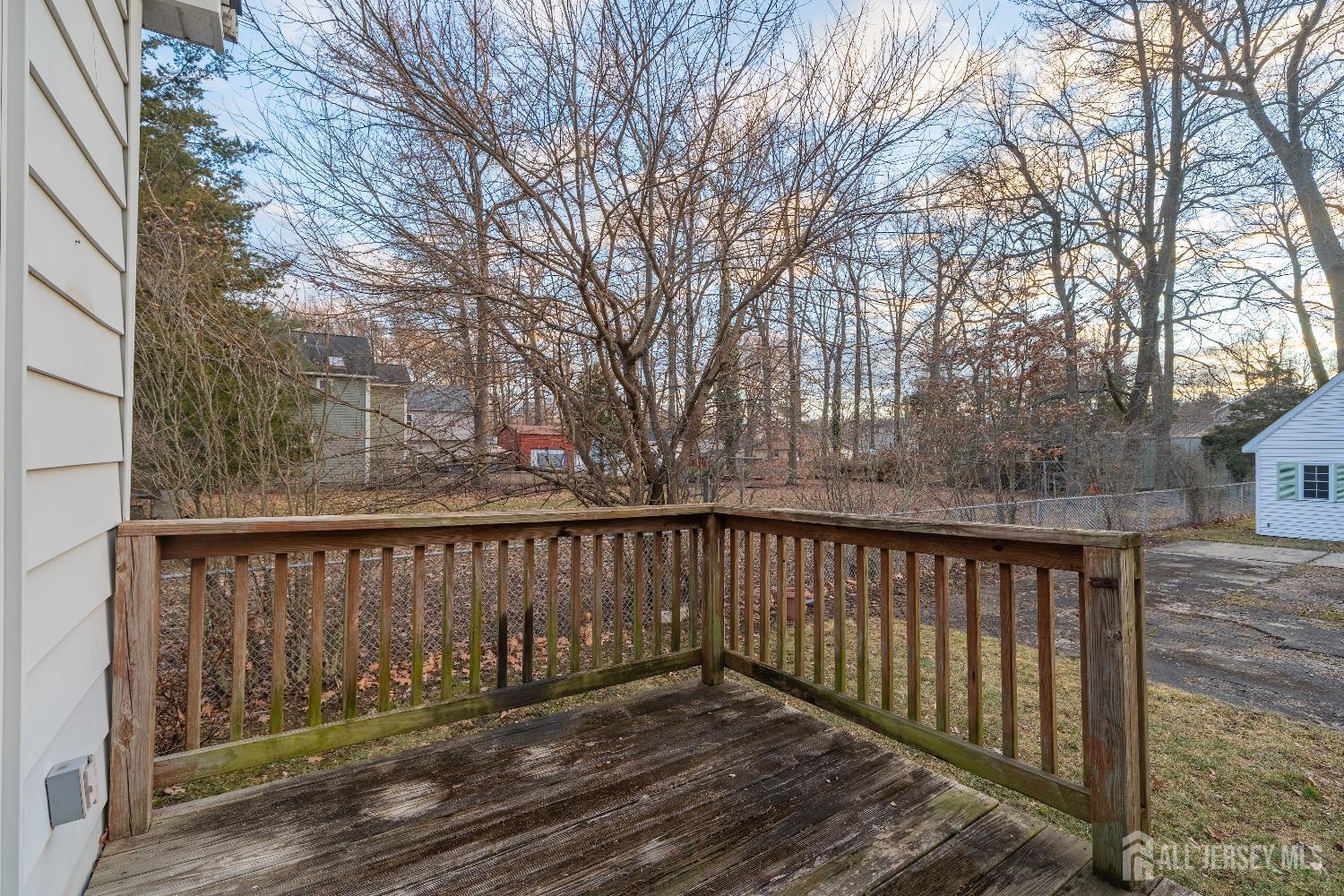 746 Spruce Road North Brunswick, NJ 08902 - Photo 18 of 29 a view of wooden balcony with outdoor space