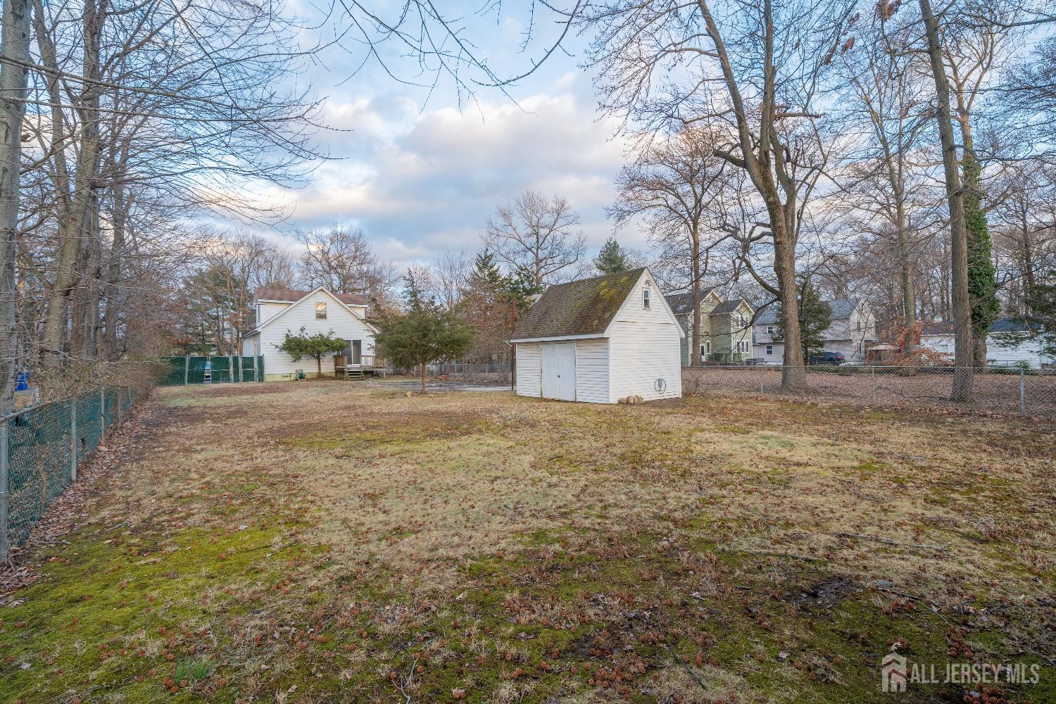 746 Spruce Road North Brunswick, NJ 08902 - Photo 22 of 29 a fire hydrant in the middle of a field