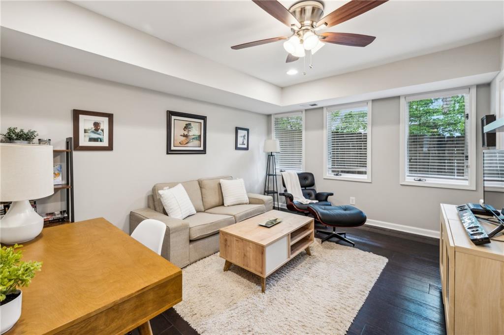 443 Lakeshore Drive Northeast Atlanta, GA 30307 - Photo 12 of 36 a living room with furniture and a large window