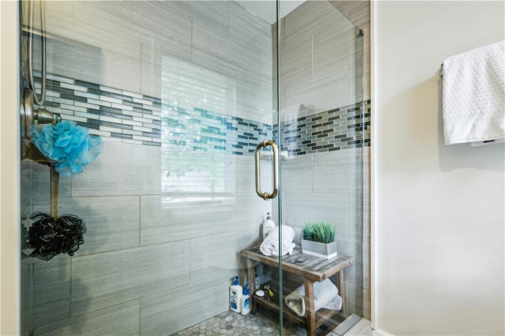 443 Lakeshore Drive Northeast Atlanta, GA 30307 - Photo 17 of 36 a bathroom with a sink a potted plant and shower