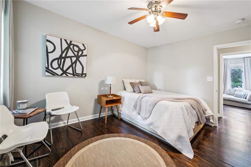 443 Lakeshore Drive Northeast Atlanta, GA 30307 - Photo 20 of 36 a bedroom with a bed and wooden floor