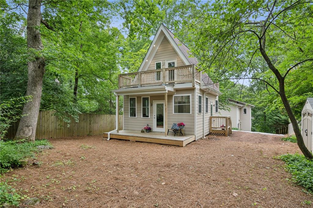 443 Lakeshore Drive Northeast Atlanta, GA 30307 - Photo 24 of 36 a front view of a house with a yard