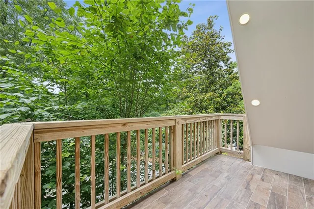 a view of balcony with yard