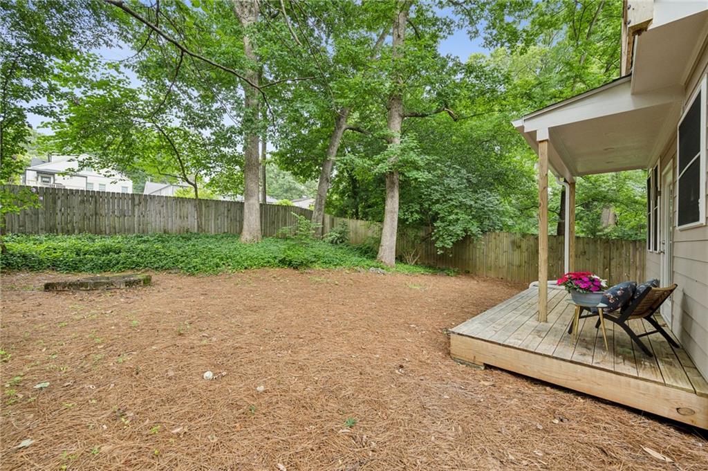 443 Lakeshore Drive Northeast Atlanta, GA 30307 - Photo 34 of 36 a view of backyard with outdoor seating and green space