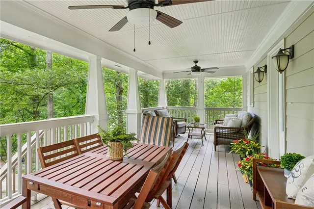 a view of a patio with wooden floor