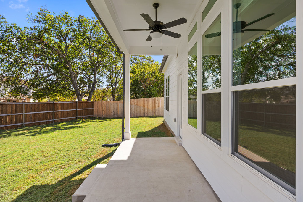 2205 Cento Walk Round Rock, TX 78664 - Photo 19 of 26 Fenced backyard with ceiling fan and a patio area
