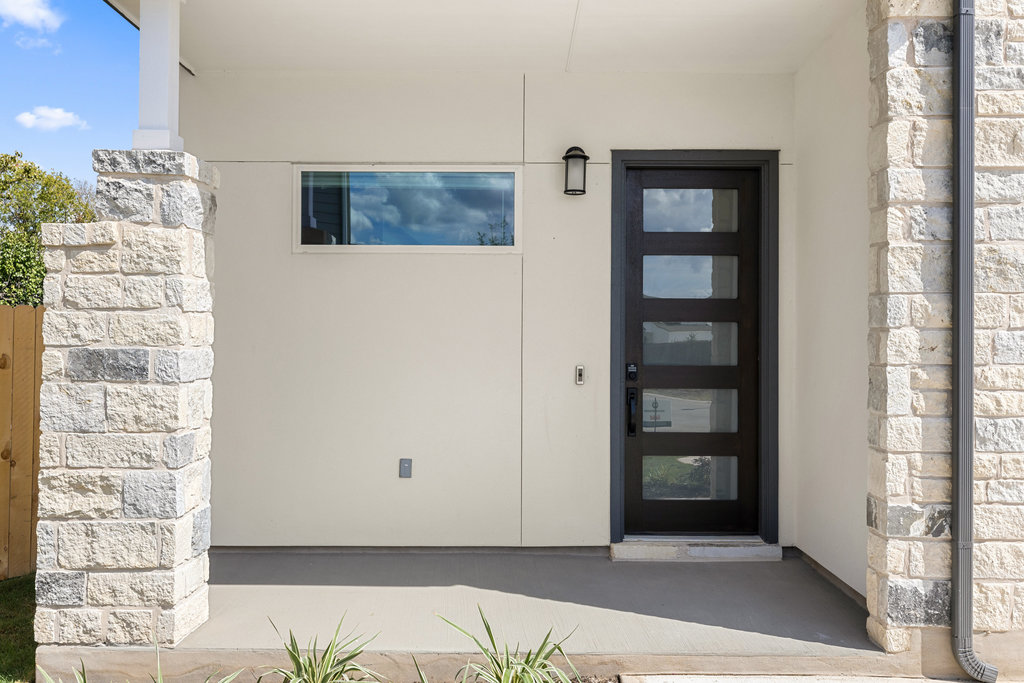 2205 Cento Walk Round Rock, TX 78664 - Photo 2 of 26 Property entrance featuring stone siding and stucco siding