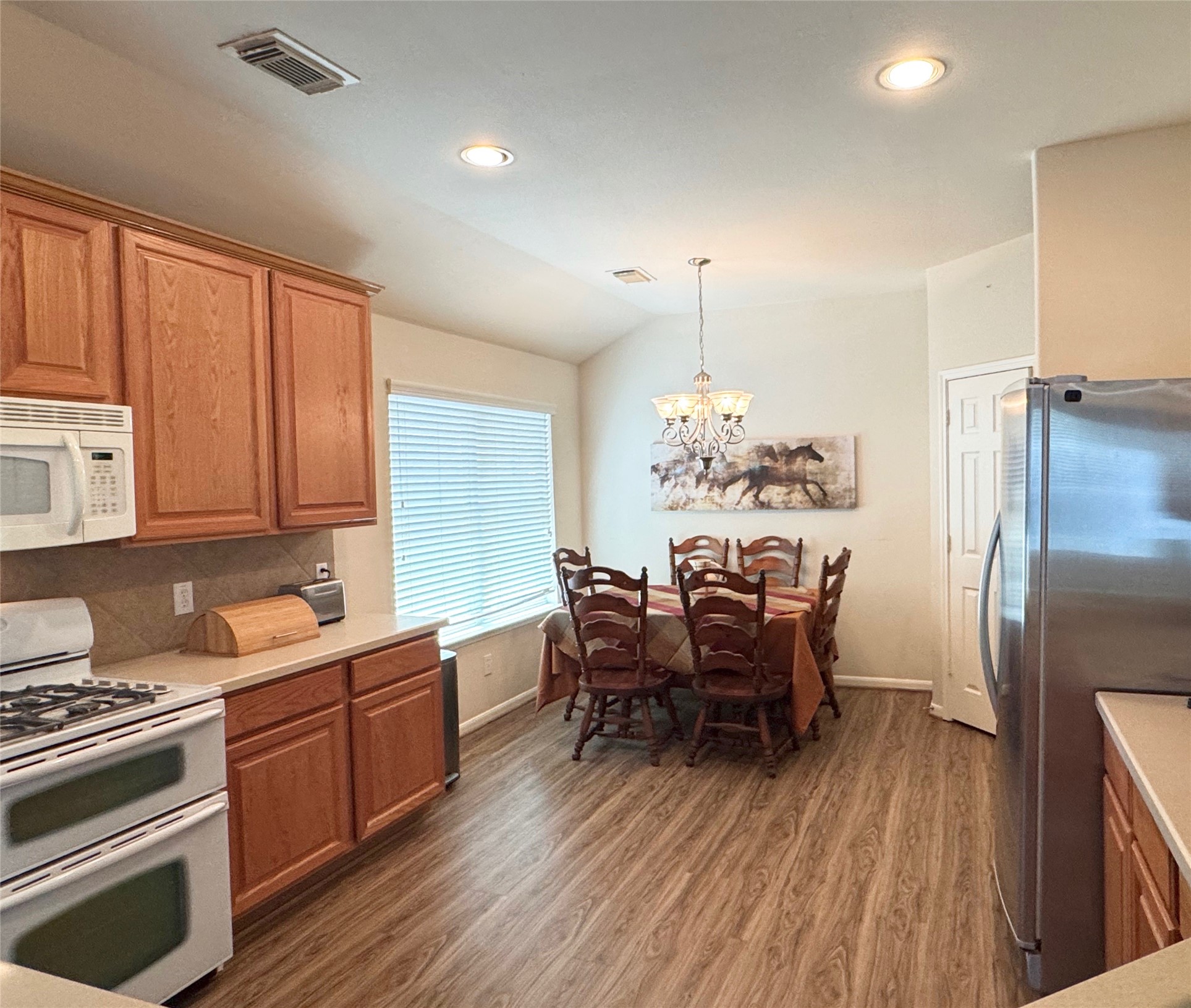 21818 Saragosa Pond Lane Spring, TX 77379 - Photo 8 of 15 The breakfast room comfortably seats six.