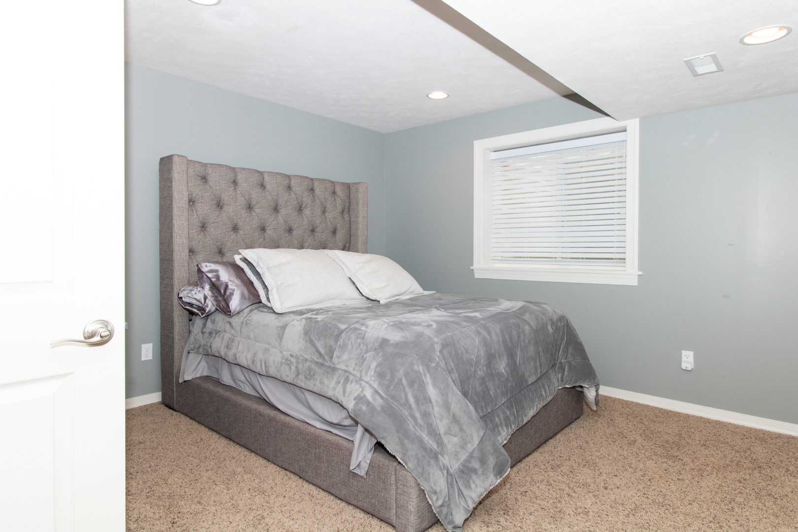 2297 Corrigan Way Normal, IL 61761 - Photo 50 of 62 a bed sitting in a bedroom next to a window