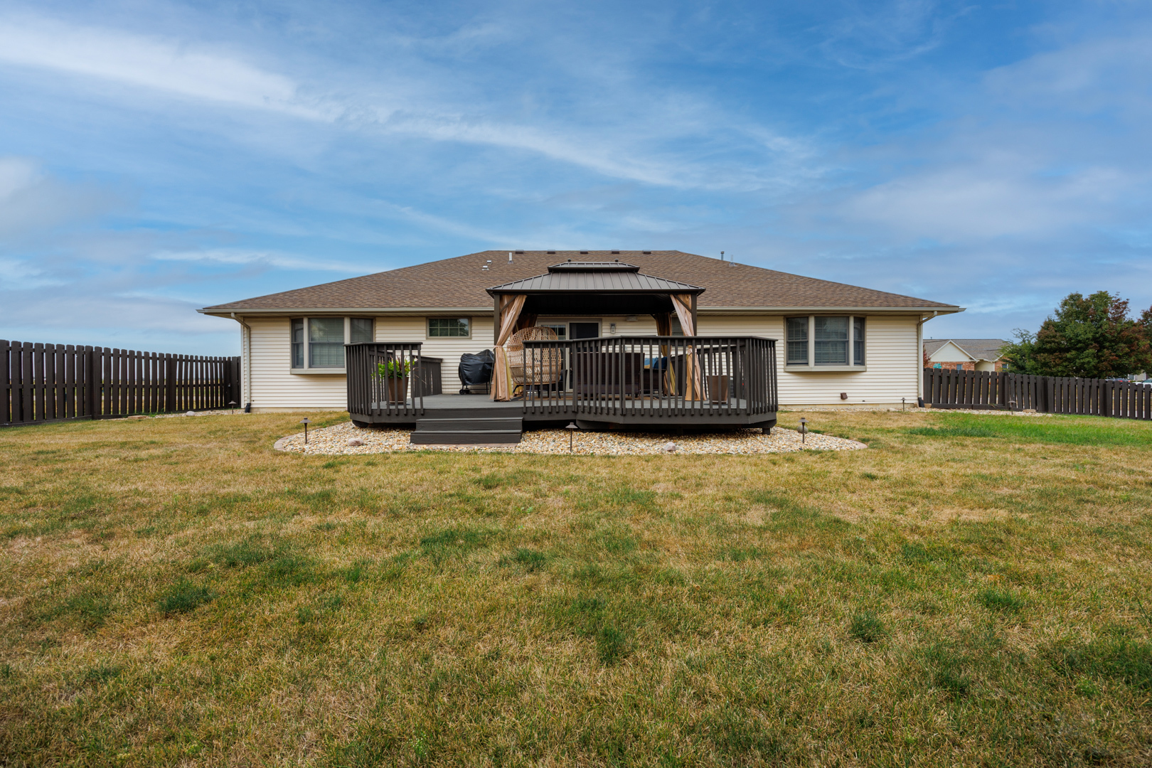 2297 Corrigan Way Normal, IL 61761 - Photo 56 of 62 a front view of a house with a garden