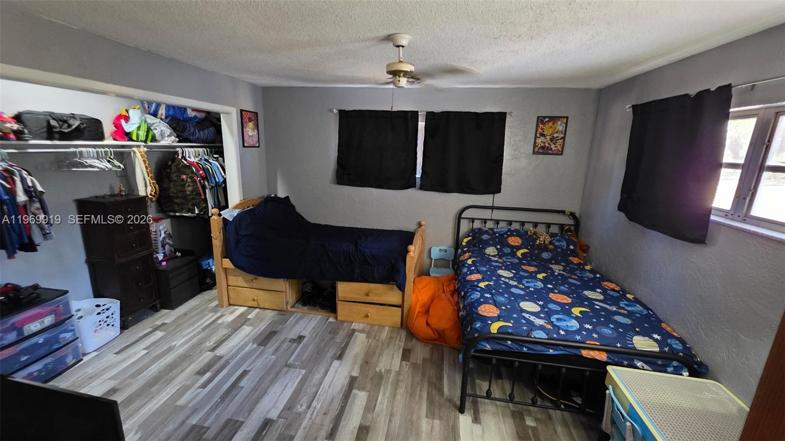 18227 Branch Road Hudson, FL 34667 - Photo 12 of 17 a living room with furniture and a flat screen tv