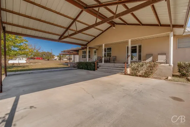 a view of a backyard of a house