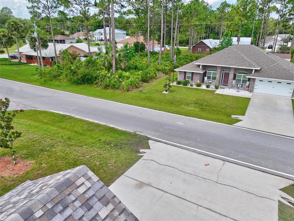91 Sea Trail Palm Coast, FL 32164 - Photo 11 of 78 a view of a house with a yard and sitting area