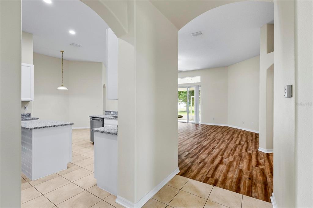 91 Sea Trail Palm Coast, FL 32164 - Photo 27 of 78 a view of a bedroom with wooden floor