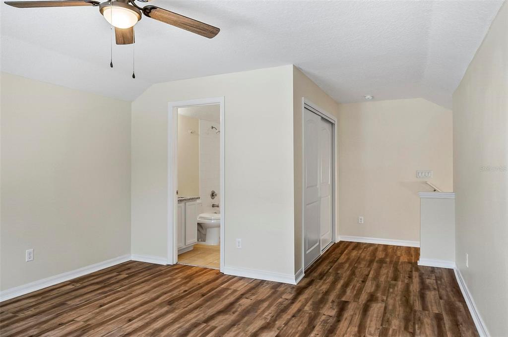 91 Sea Trail Palm Coast, FL 32164 - Photo 38 of 78 a view of a room with wooden floor fan and a window