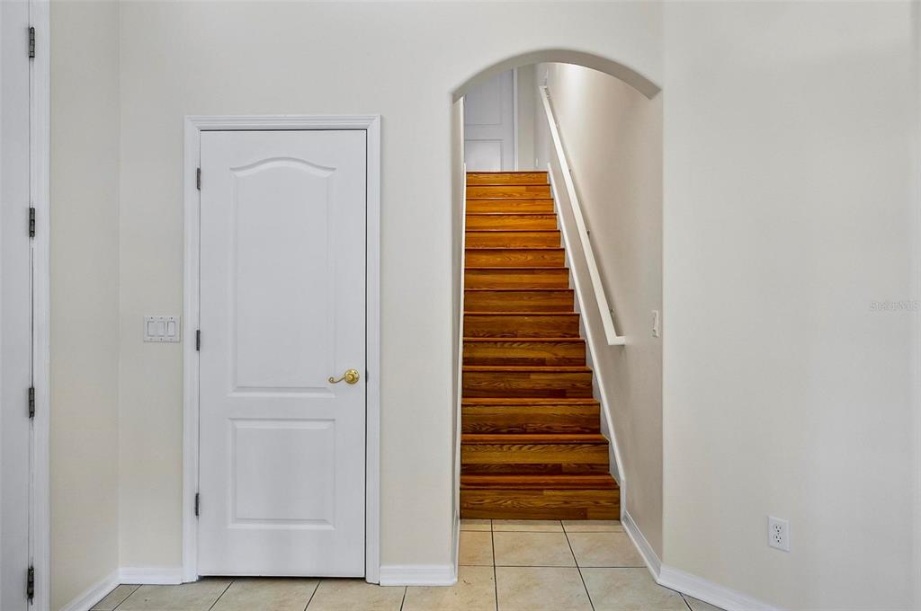 91 Sea Trail Palm Coast, FL 32164 - Photo 72 of 78 an entryway space with wooden floor