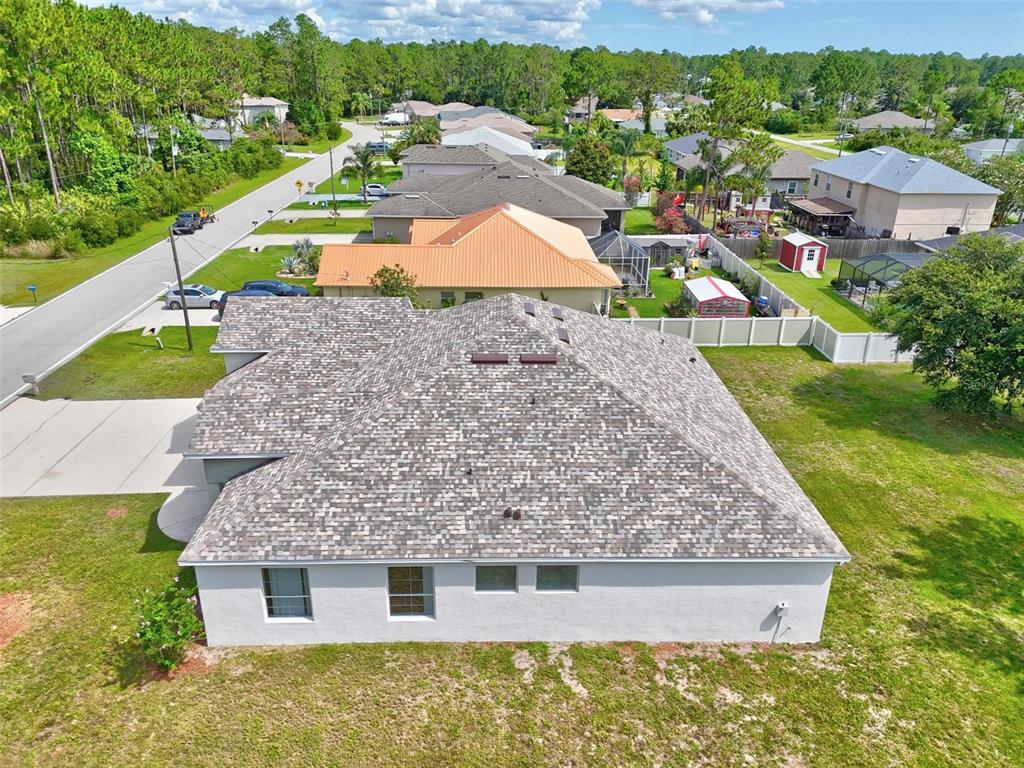 91 Sea Trail Palm Coast, FL 32164 - Photo 8 of 78 an aerial view of a house with a yard