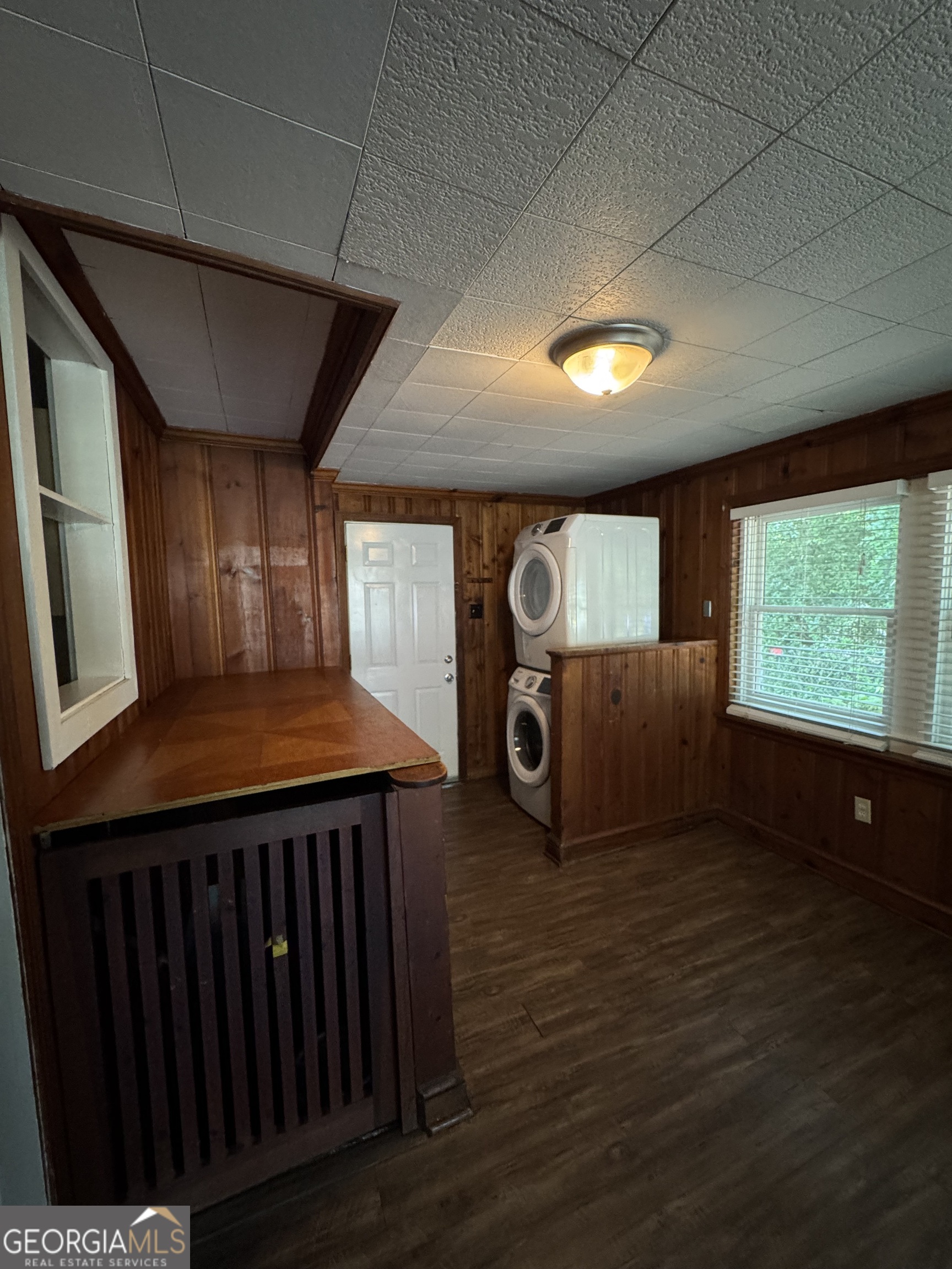 1980 South Lumpkin Street, Unit B Athens, GA 30606 - Photo 3 of 13 a view of an empty room with a window