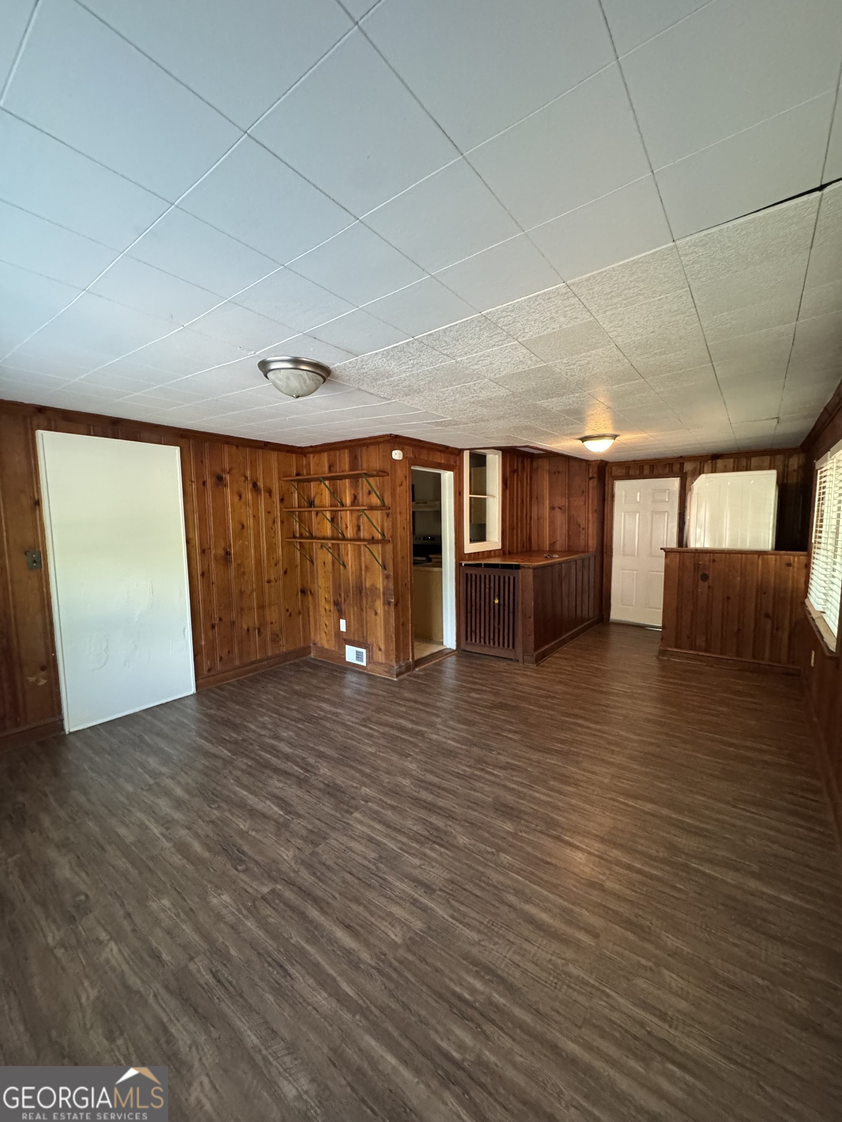 1980 South Lumpkin Street, Unit B Athens, GA 30606 - Photo 5 of 13 a view of an empty room with a window