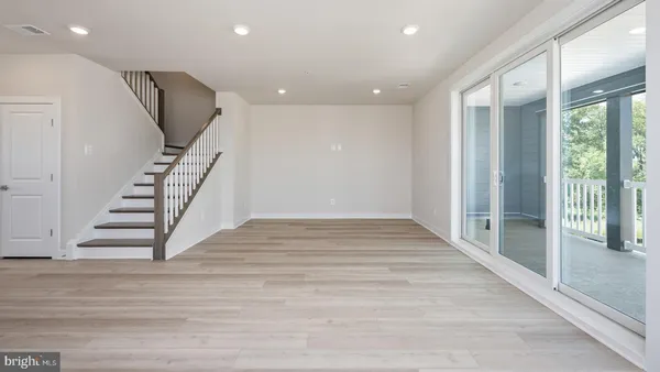 a view of entryway with wooden floor