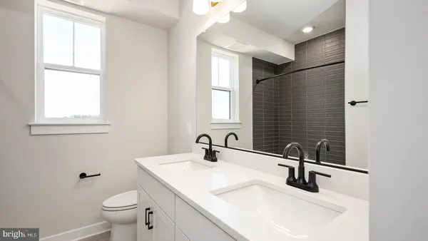 a bathroom with a sink and a toilet