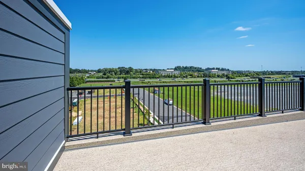 a view of a balcony with an outdoor space