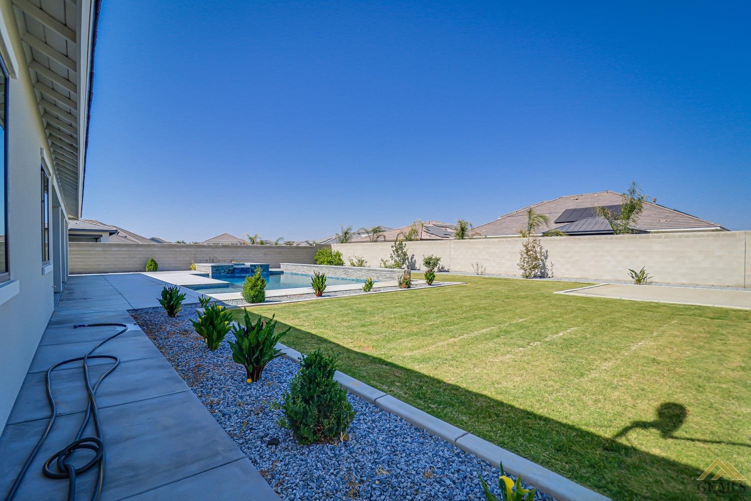 Undisclosed Address Bakersfield, CA 93311 - Photo 32 of 34 a view of a backyard with lawn chairs