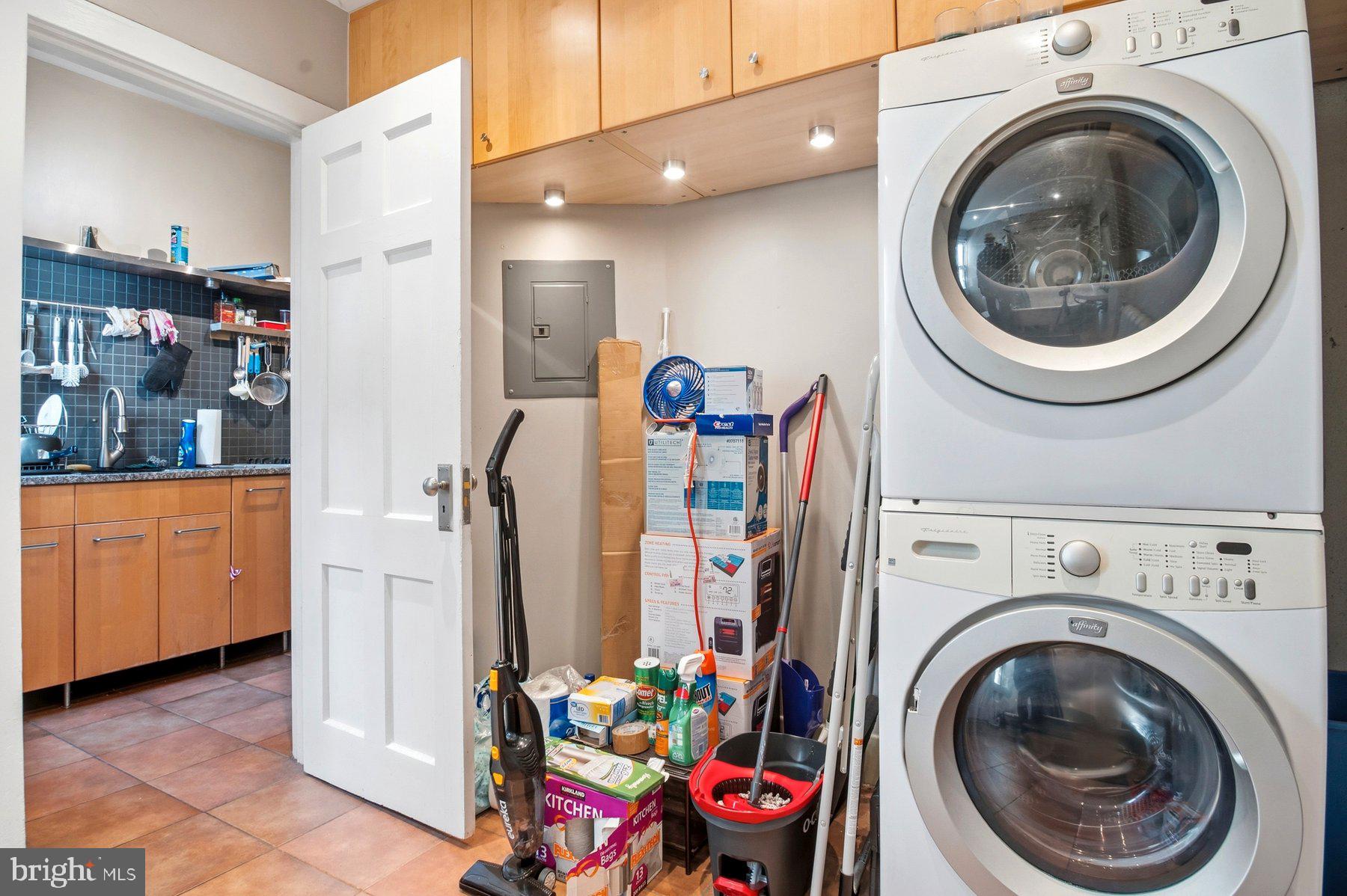 101 West 39th Street, Unit C3 Baltimore, MD 21210 - Photo 19 of 28 a view of a storage & utility room with washer and dryer