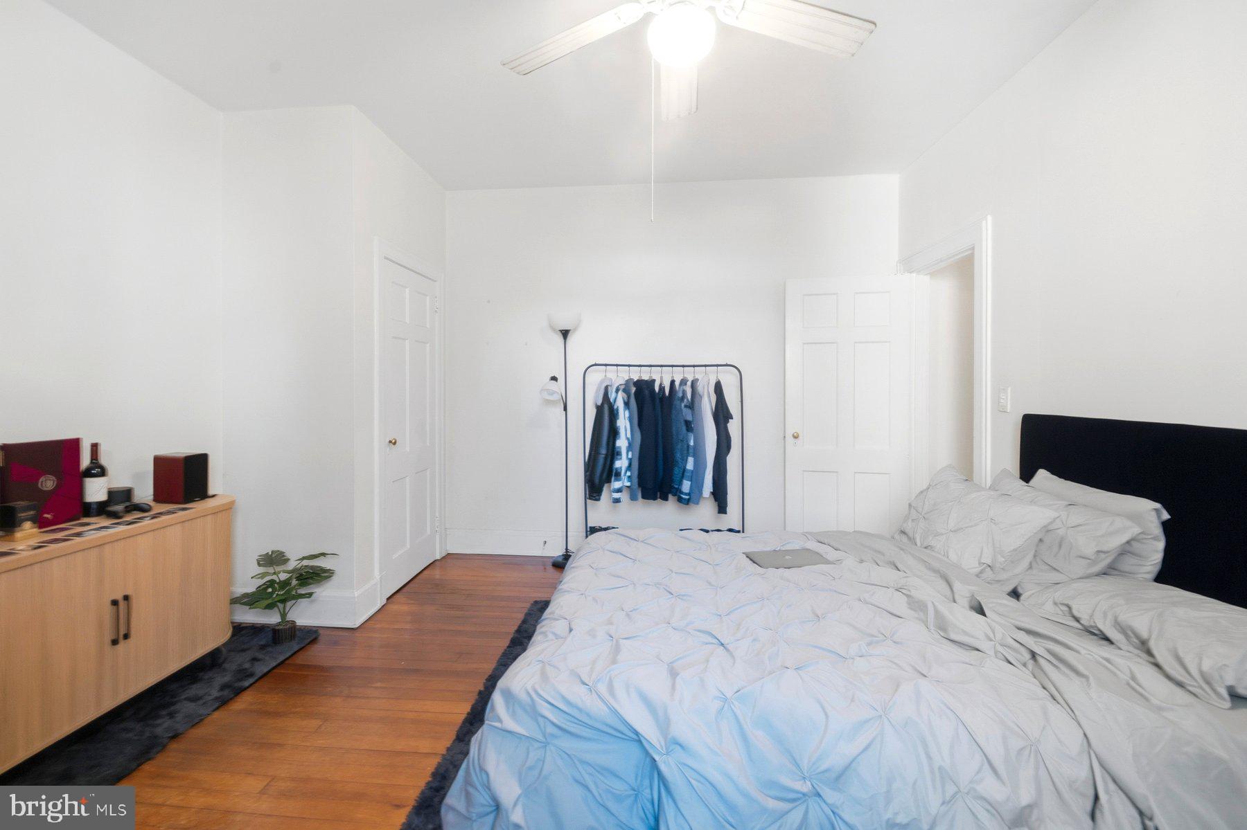101 West 39th Street, Unit C3 Baltimore, MD 21210 - Photo 28 of 28 a bedroom with a bed and a closet