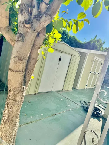 a view of a swimming pool with outdoor seating