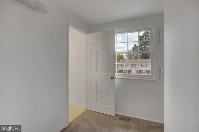 a view of a small space with windows