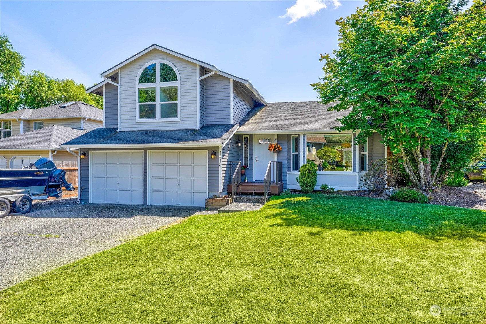 1410 220th Street Southwest Bothell, WA 98021 - Photo 1 of 25 a view of a house with a yard and sitting area
