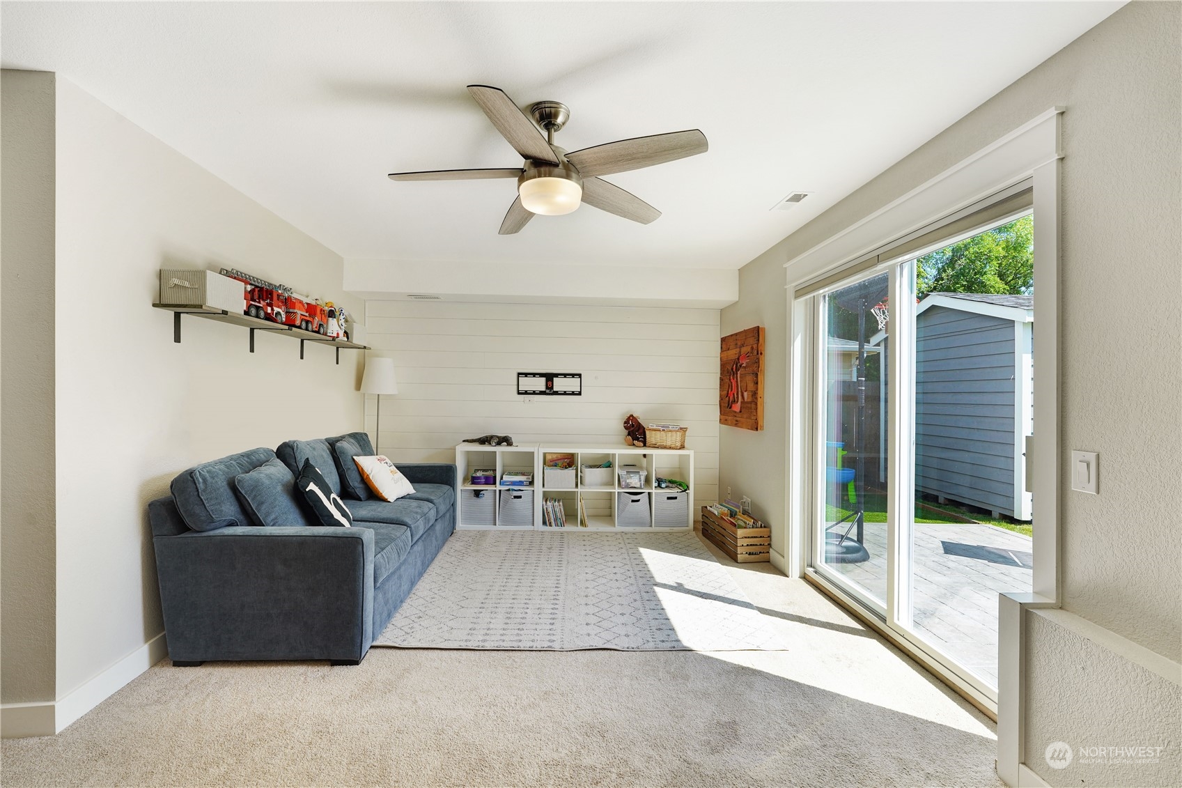 1410 220th Street Southwest Bothell, WA 98021 - Photo 24 of 25 a living room with furniture and a large window