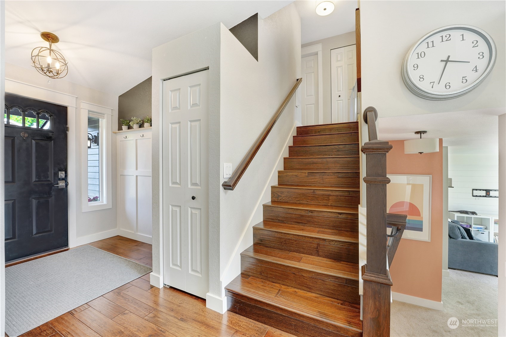 1410 220th Street Southwest Bothell, WA 98021 - Photo 10 of 25 a view of entryway with wooden floor