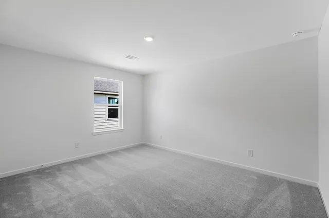 a view of a room that has a window in it