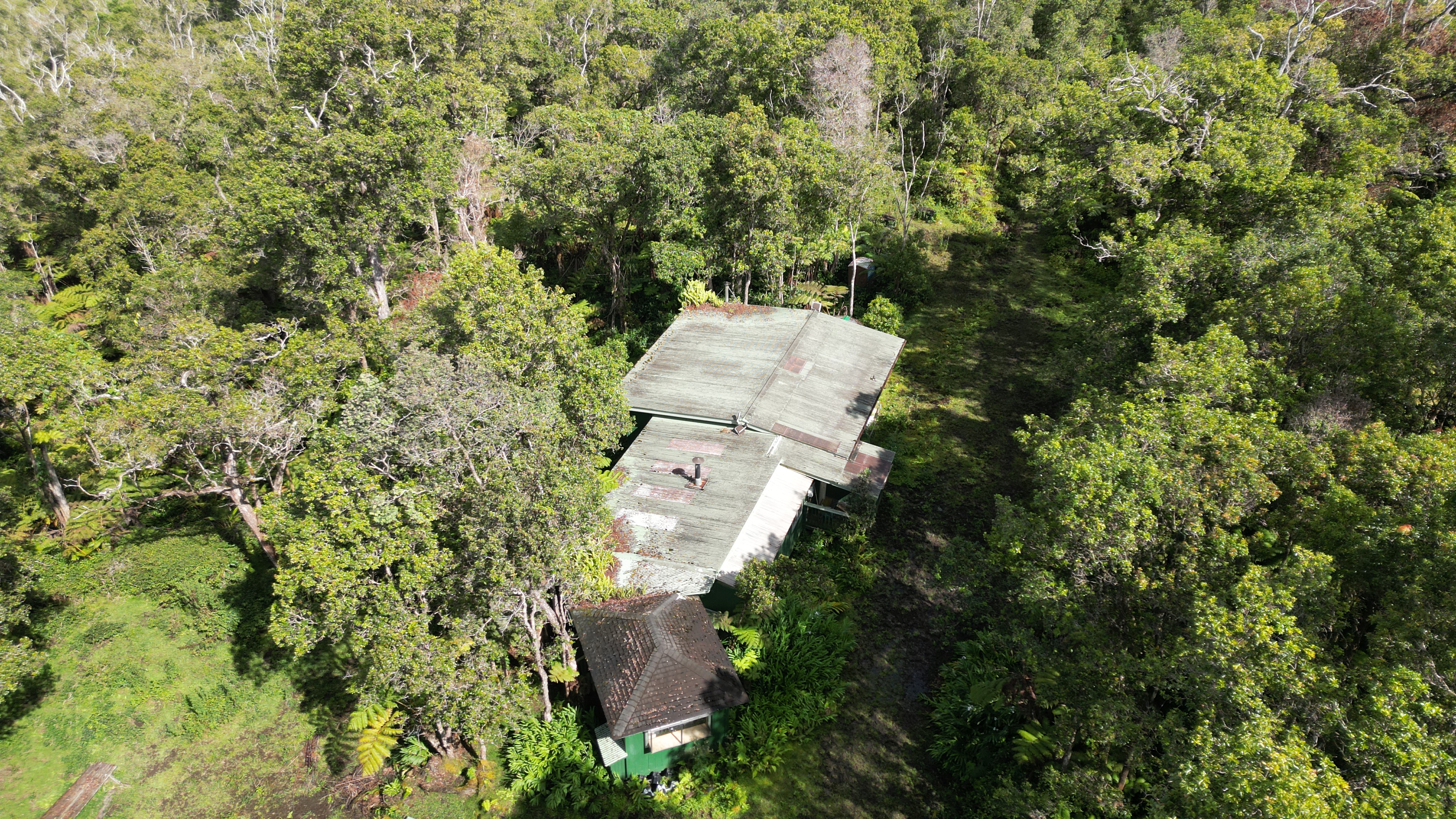 Mamalahoa Highway Captain Cook, HI 96704 - Photo 8 of 19 an aerial view of a house with yard