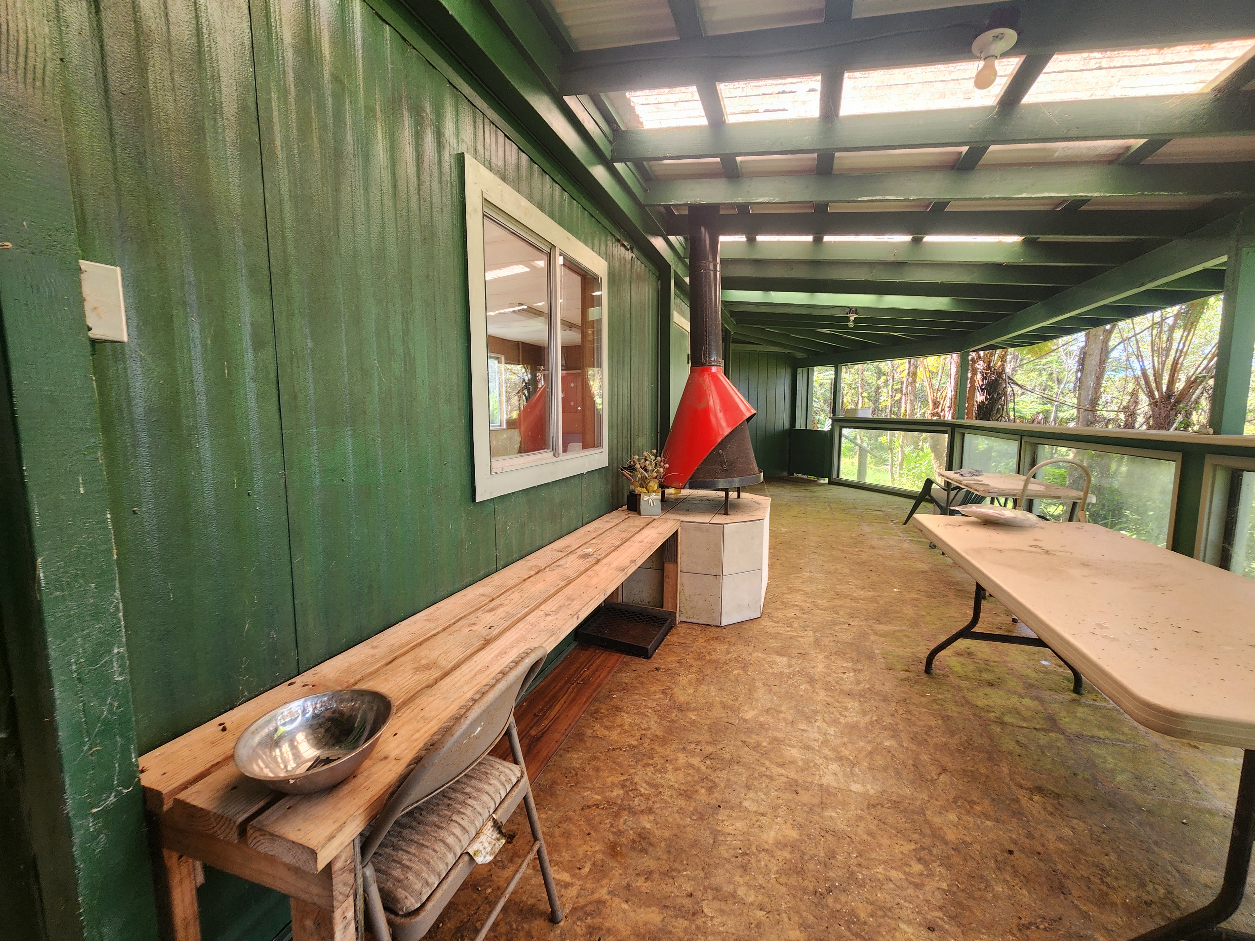 Mamalahoa Highway Captain Cook, HI 96704 - Photo 9 of 19 a sitting area with furniture and rug