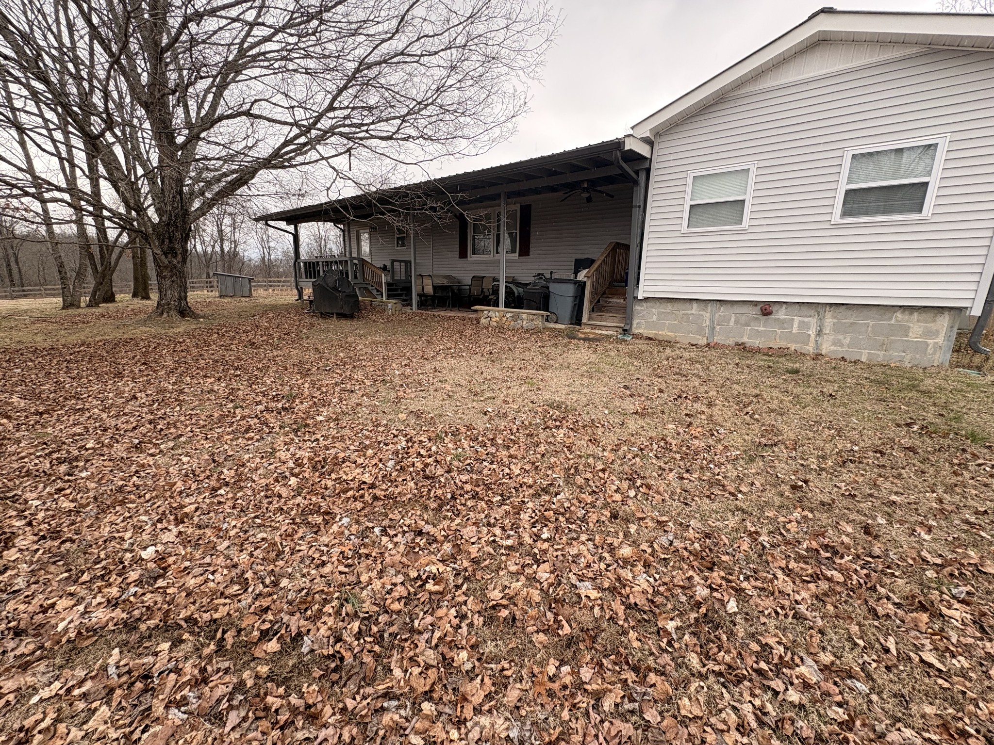 4454 Nancy Green Ridge Road Pulaski, TN 38478 - Photo 12 of 40 a backyard of a house with lots of green space