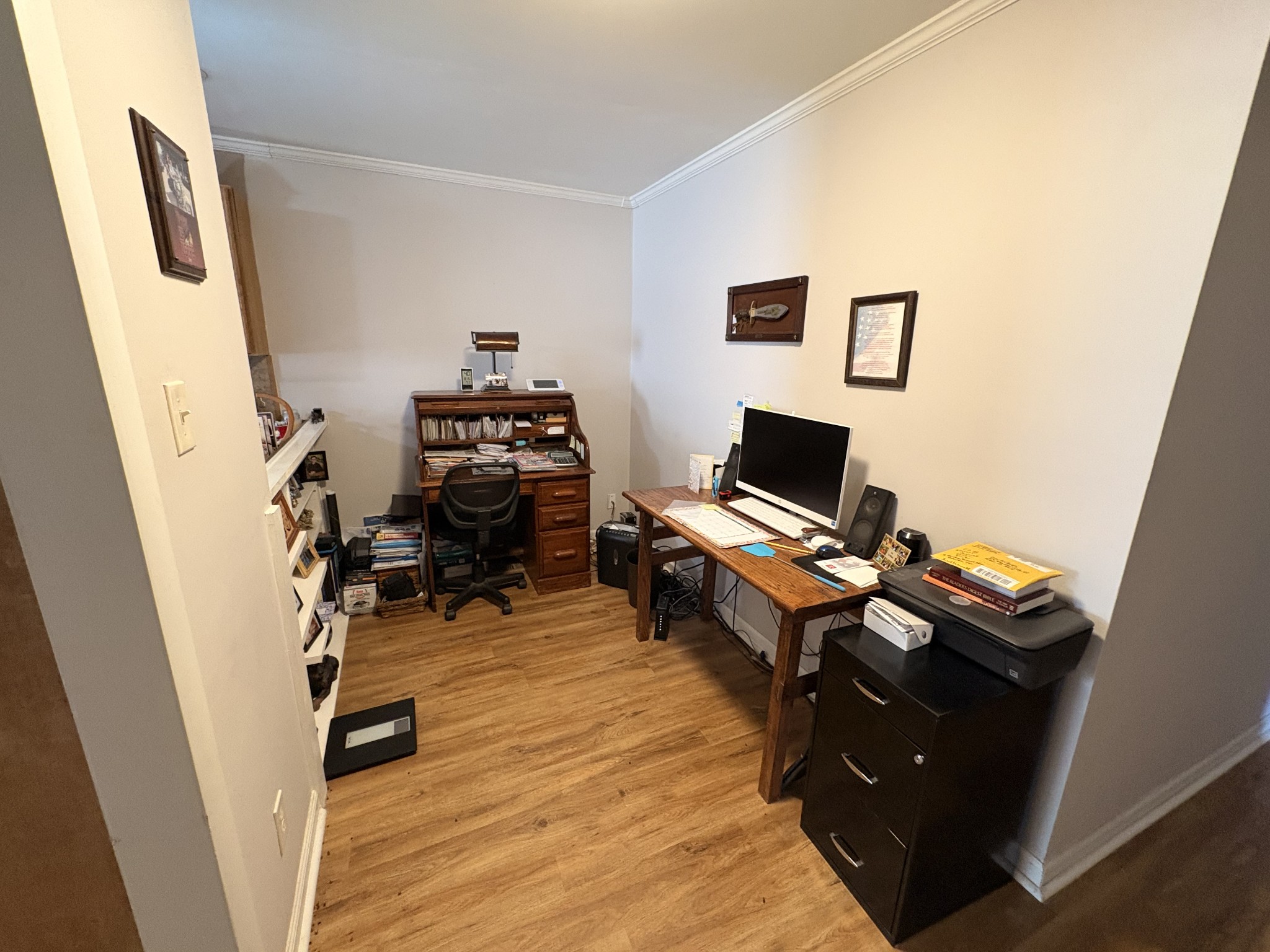 4454 Nancy Green Ridge Road Pulaski, TN 38478 - Photo 13 of 40 a view of a workspace with furniture and a gate
