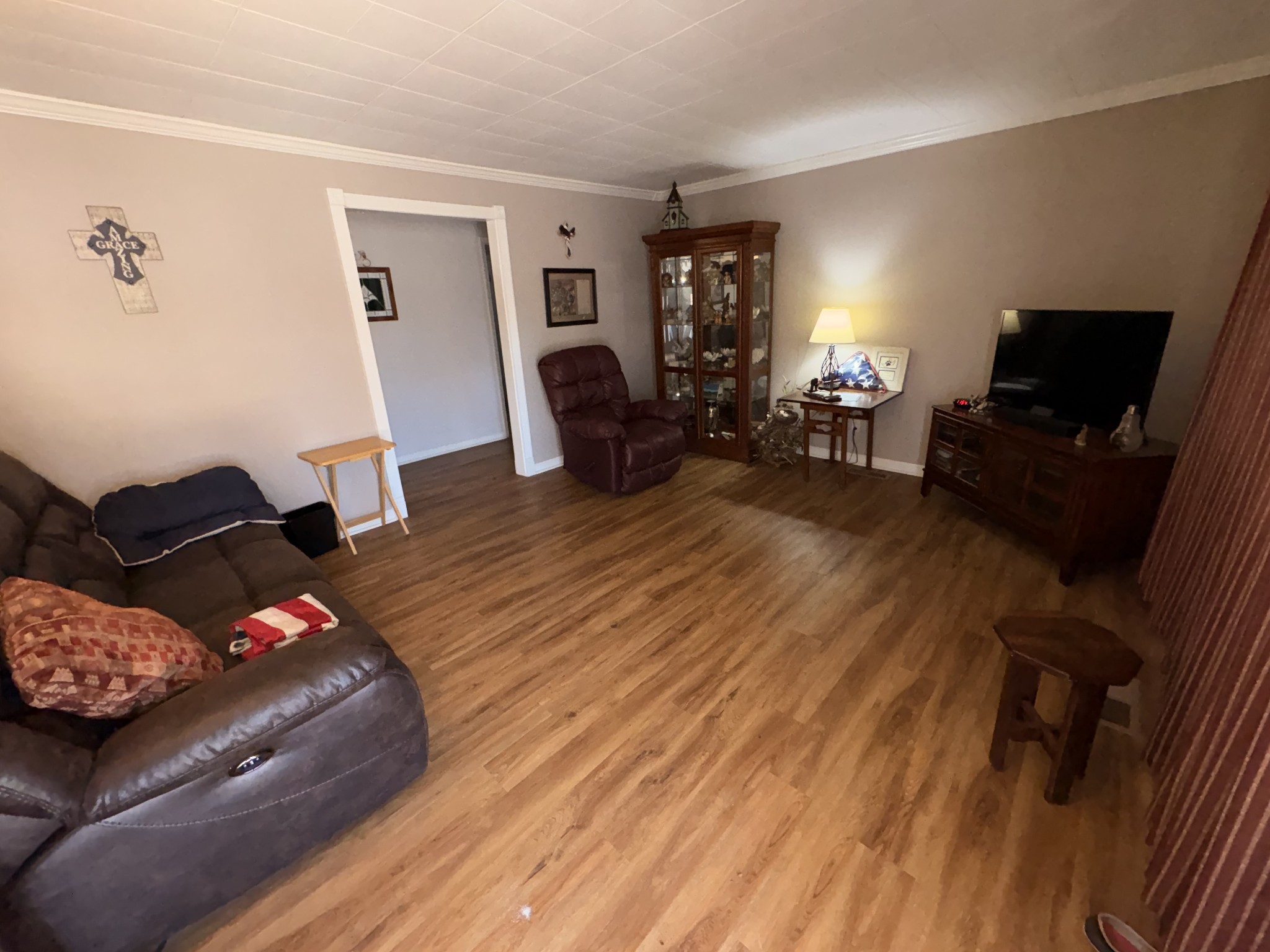 4454 Nancy Green Ridge Road Pulaski, TN 38478 - Photo 2 of 40 a living room with furniture and a flat screen tv