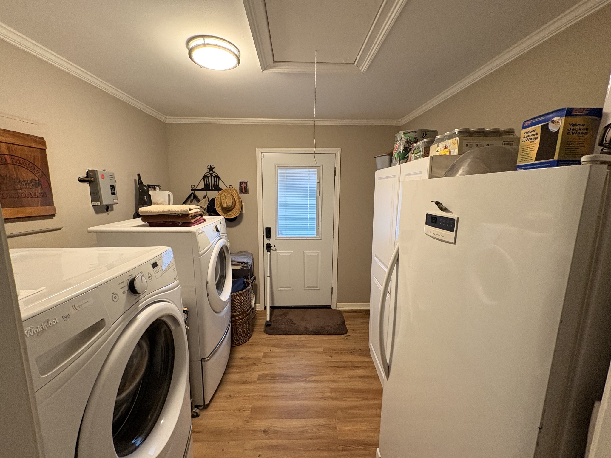 4454 Nancy Green Ridge Road Pulaski, TN 38478 - Photo 25 of 40 a view of a storage and utility room with washer and dryer