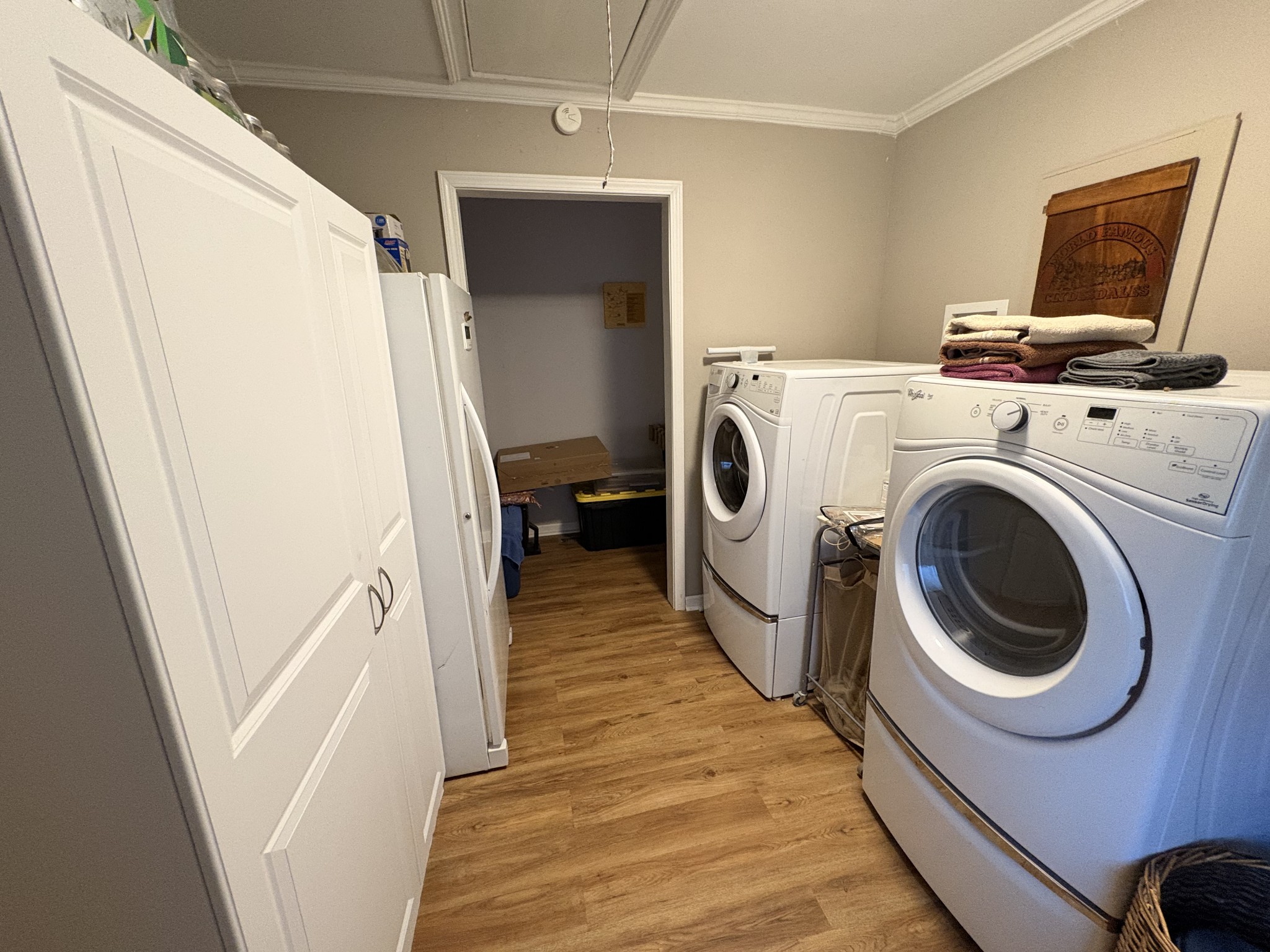 4454 Nancy Green Ridge Road Pulaski, TN 38478 - Photo 27 of 40 a view of a storage and utility room with washer and dryer