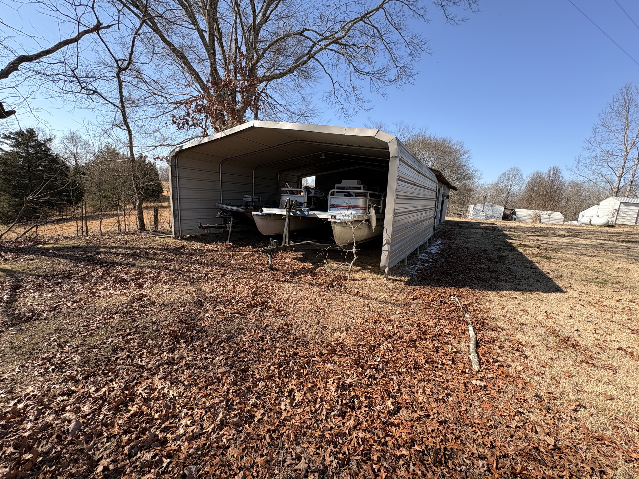4454 Nancy Green Ridge Road Pulaski, TN 38478 - Photo 33 of 40 a view of a house with a yard