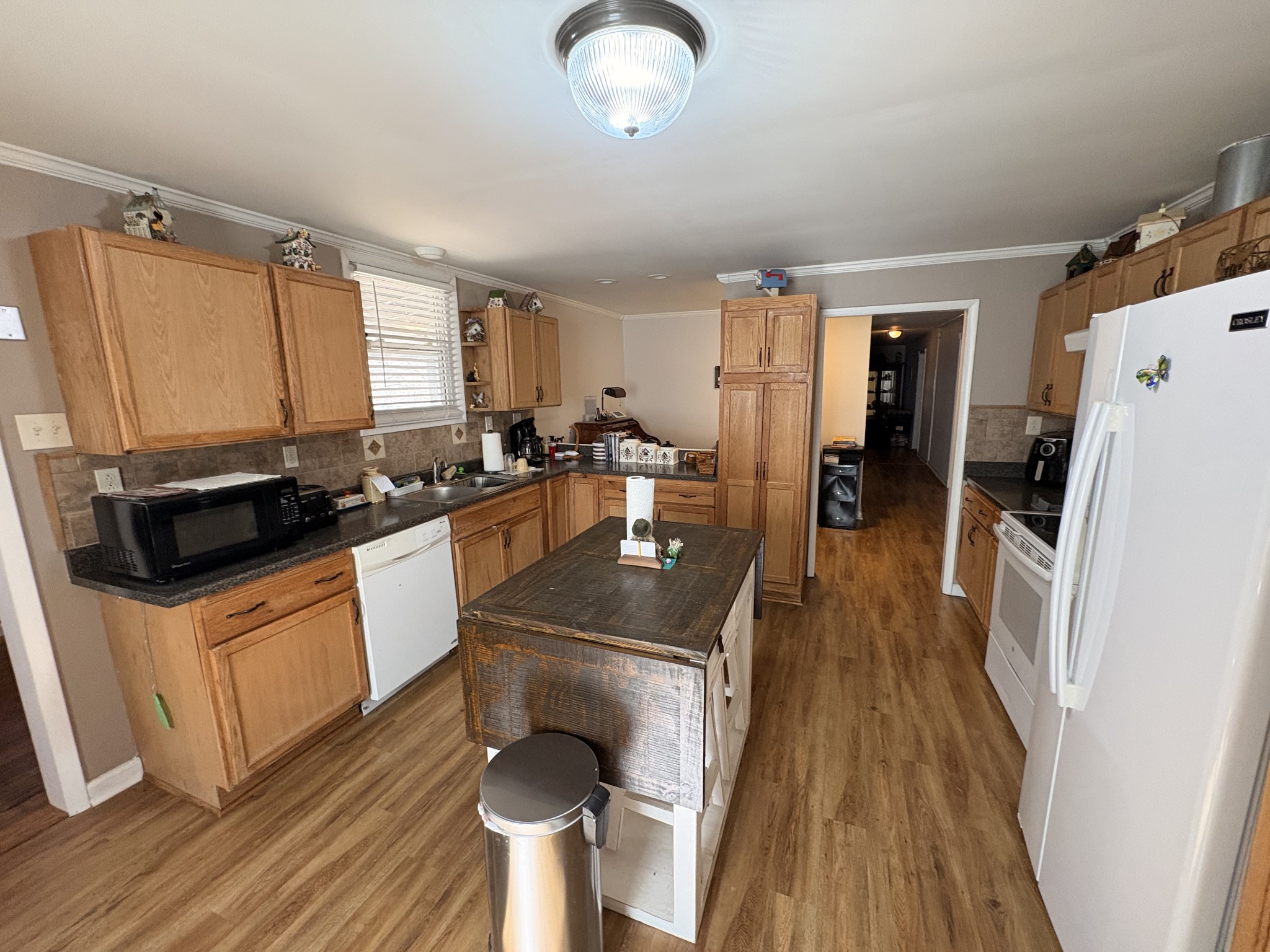 4454 Nancy Green Ridge Road Pulaski, TN 38478 - Photo 4 of 40 a kitchen with a sink appliances and cabinets