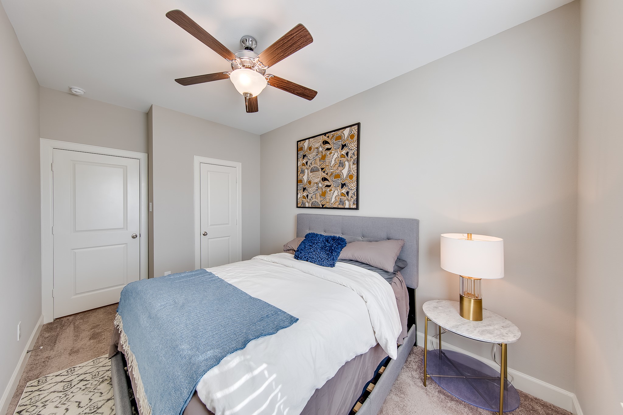 1436 Prince Street, Unit B Houston, TX 77008 - Photo 15 of 20 a bedroom with a bed and a lamp on a dresser