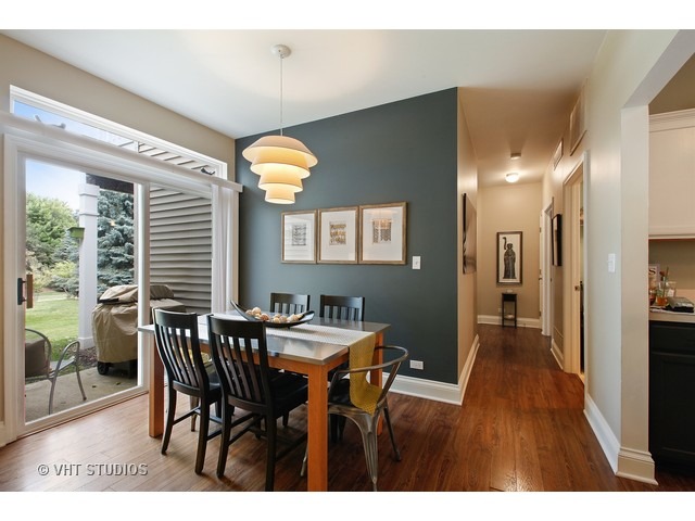 150 Hidden Pond Circle Aurora, IL 60504 - Photo 9 of 15 a view of a dining room with furniture and wooden floor