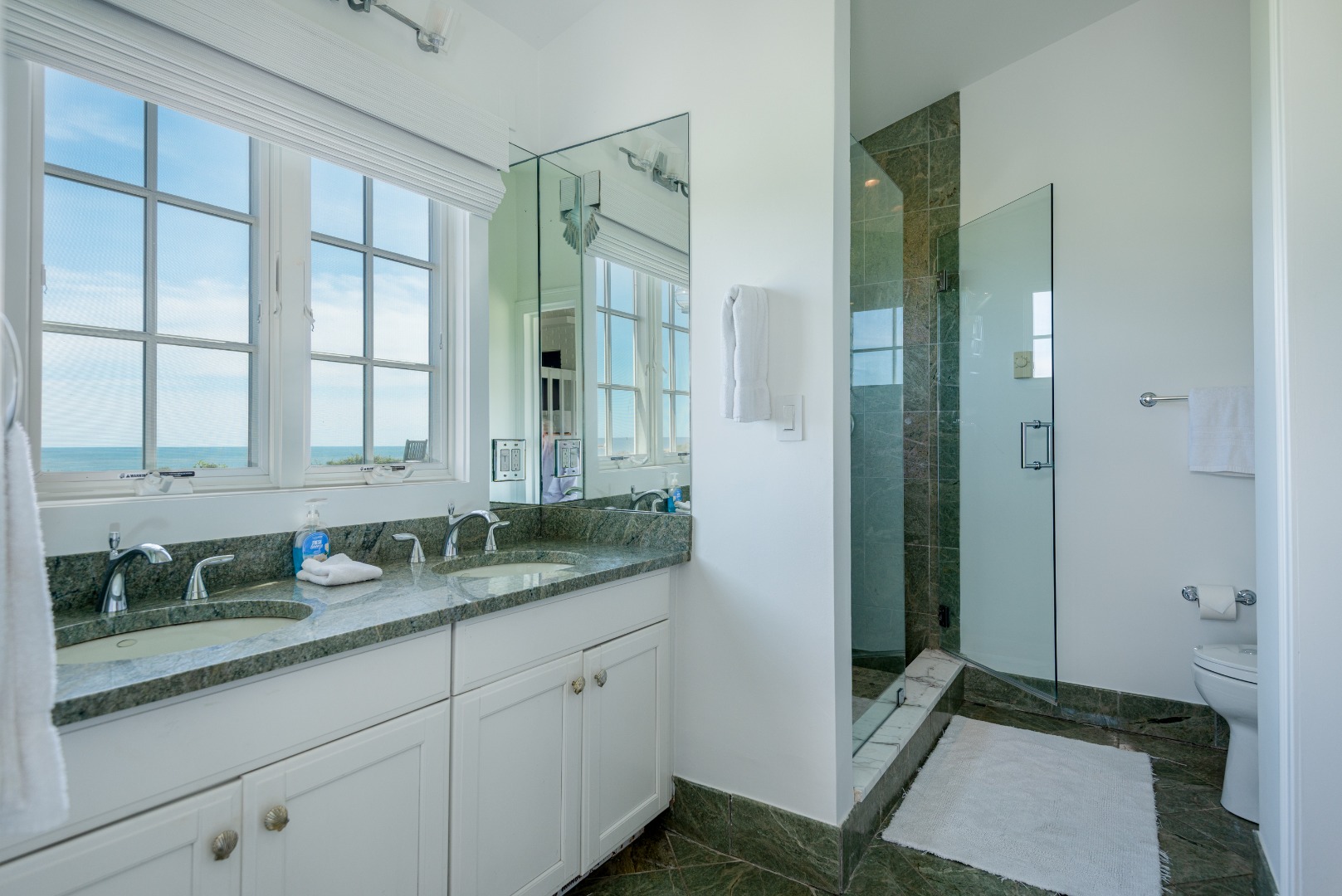 1 Reeds Way Nantucket, MA 02554 - Photo 47 of 51 a bathroom with a granite countertop sink and a mirror