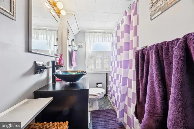 a bedroom with a bed and a closet