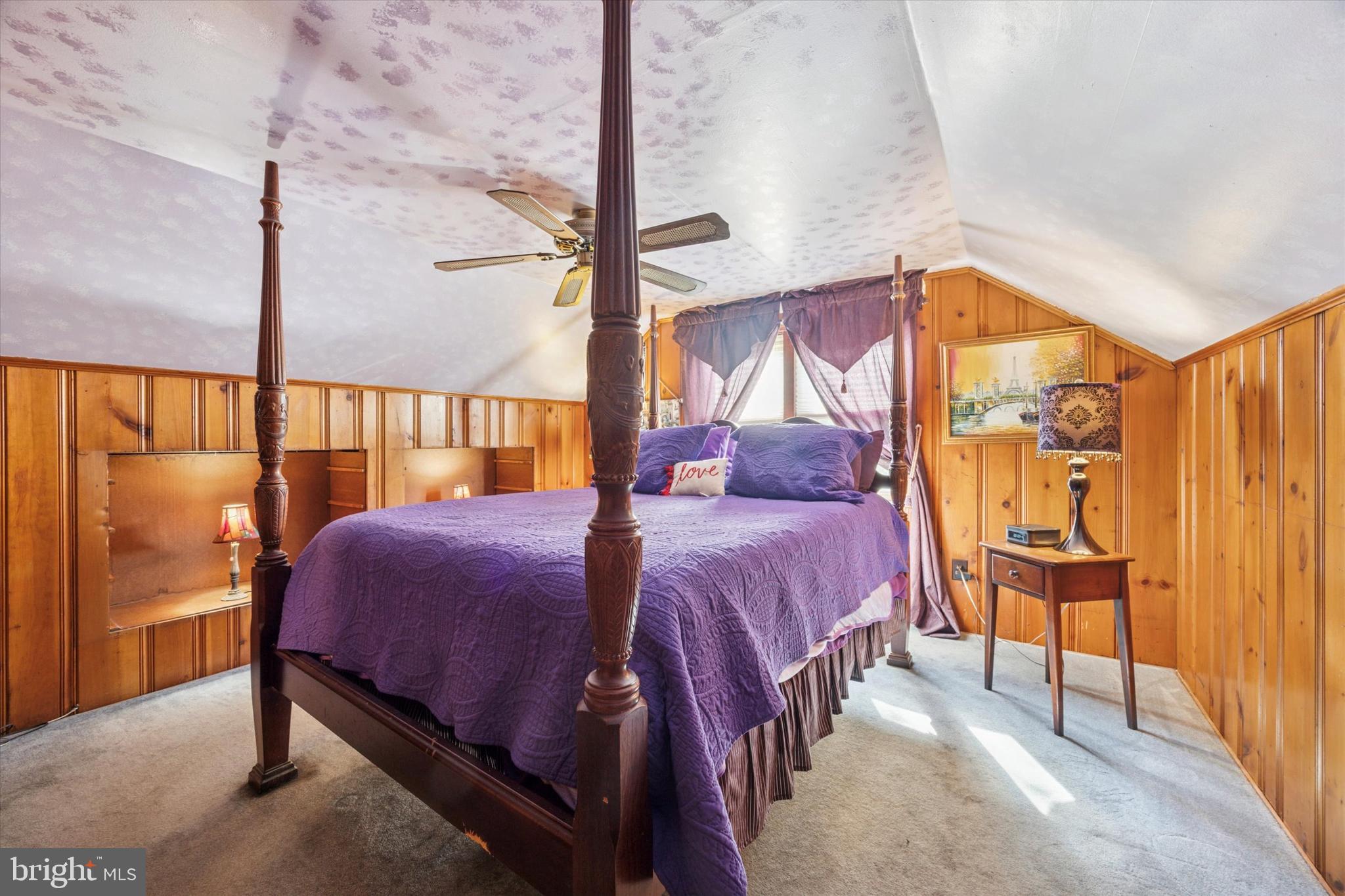 4410 School Lane Drexel Hill, PA 19026 - Photo 21 of 27 a bedroom with a bed and a painting on the wall