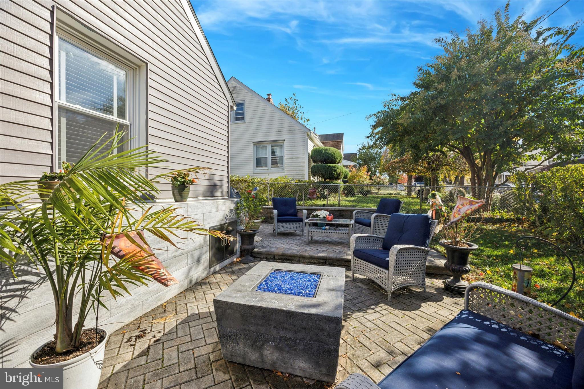 4410 School Lane Drexel Hill, PA 19026 - Photo 24 of 27 a view of a patio with couches table and chairs and potted plants